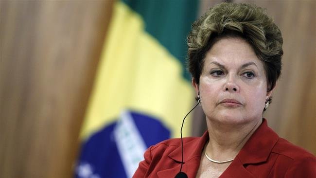 Lạm phát tăng đang gây khó cho bà Dilma Rousseff - Ảnh: AFP