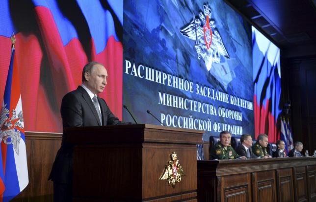 Tổng thống Nga Vladimir Putin tại cuộc họp hàng năm của Bộ quốc phòng Nga ngày 11-12 - Ảnh:Reuters