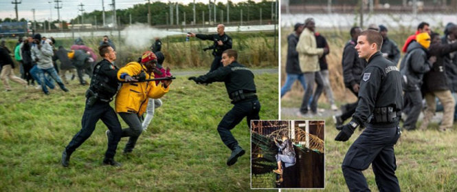 Cảnh sát Pháp đụng độ người di cư gần đường hầm Channel Tunnel - Ảnh: AFP