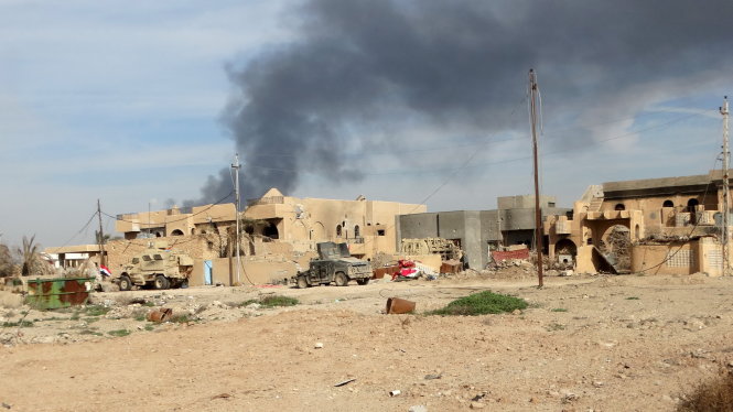 Thành phố Ramadi đã bị tàn phá nặng nề sau nhiều tháng giao tranh - Ảnh: Reuters