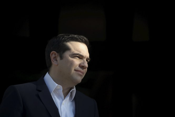 Thủ tướng Hi Lạp Alexis Tsipras đầu hàng trước sức ép của châu Âu - Ảnh: Reuters