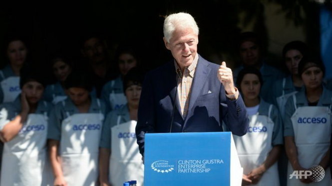 Cựu tổng thống Bill Clinton từng vướng bê bối tình dục với nhân viên - Ảnh: AFP