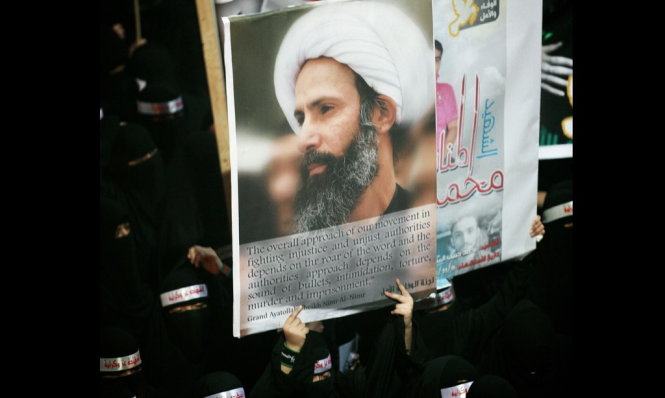Người dân biểu tình phản đối  bắt giam và xử tử ông Nimr al-Nimr - Ảnh: AP