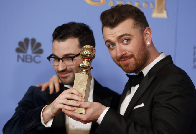 Sam Smith (R) and Jimmy Napes pose with the award for Best Original Song - Motion Picture for 