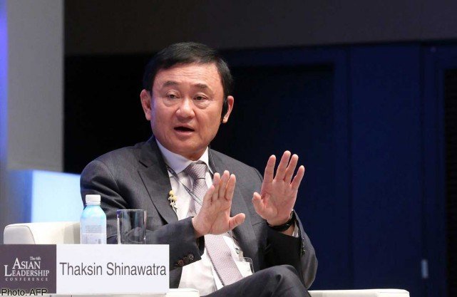 Cựu thủ tướng Thaksin hiện đang sống lưu vong ở nước ngoài và bị tước hộ chiếu. Ảnh: AFP
