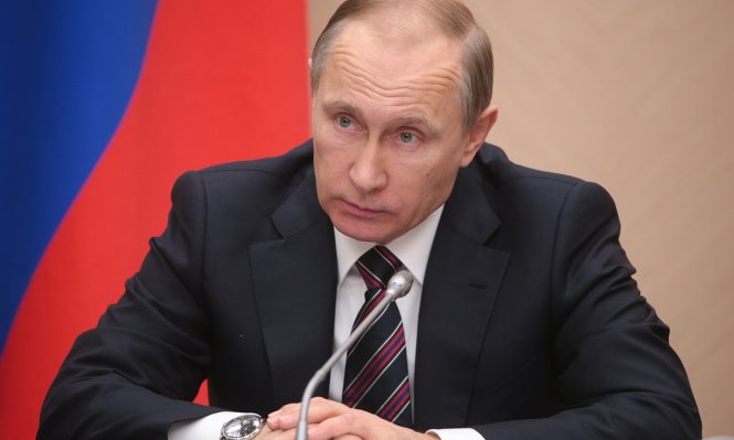 Tổng thống Putin công bố Nga đã sản xuất được vắc xin Ebola - Ảnh: TASS