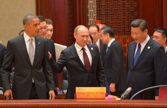 Lãnh đạo ba nước Mỹ, Nga, Trung Quốc trong buổi ký kết hiệp định về khí đốt tháng 11-2015 - Ảnh: AP