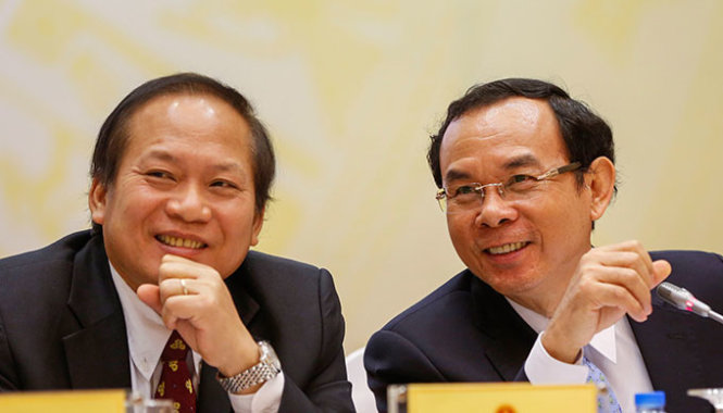 Bộ trưởng, Chủ nhiệm Văn phòng Chính phủ Nguyễn Văn Nên (phải) và Thứ trưởng Bộ Thông tin - truyền thông Trương Minh Tuấn tại buổi họp báo - Ảnh: Việt Dũng