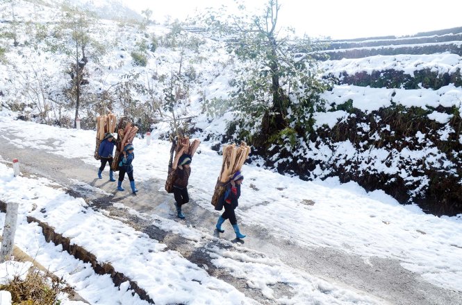 Rét hại và mưa tuyết ở phía bắc ảnh hưởng lớn đến sinh hoạt của người dân- Ảnh: Ngọc Triển