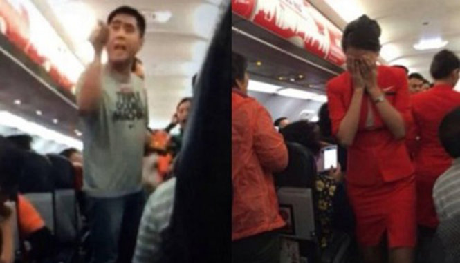 Hành khách Trung Quốc có hành vi thô lỗ trên chuyến bay của hãng Air Asia - Ảnh: SCMP