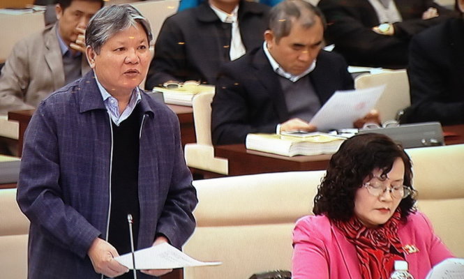 Ông Hà Hùng Cường thay mặt Chính phủ kiến nghị Ủy ban Thường vụ Quốc hội cho lùi thời gian trình dự án Luật biểu tình - Ảnh: L.K