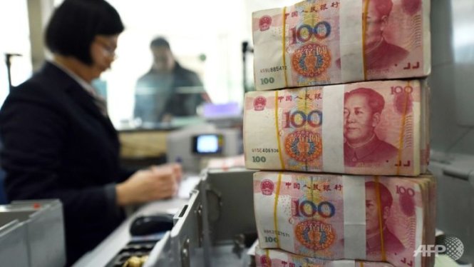 Thống đốc ngân hàng trung ương Trung Quốc cam kết tại G-20 rằng nước này sẽ không phá giá đồng nhân dân tệ để hỗ trợ xuất khẩu - Ảnh: AFP