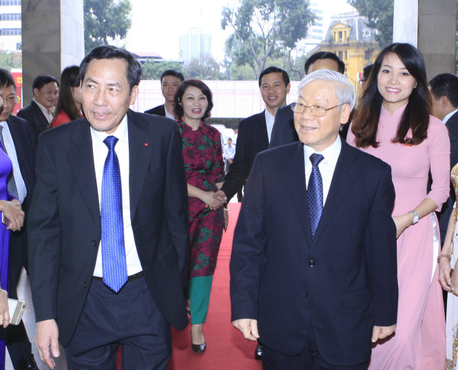 Tổng bí thư Nguyễn Phú Trọng đến dự lễ kỷ niệm 65 năm ngày báo Nhân Dân ra số báo đầu tiên và đón nhận Huân chương Độc lập hạng nhất - Ảnh: TTXVN