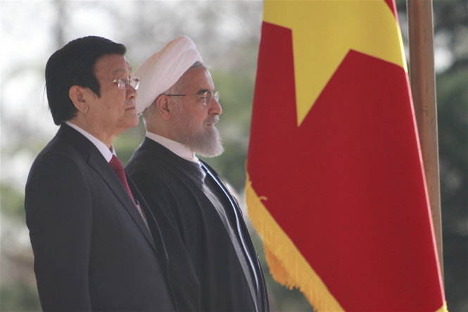 Chủ tịch nước Trương Tấn Sang và Tổng thống Iran Hassan Rouhani tại lễ đón chính thức - Ảnh: V.V.Thành
