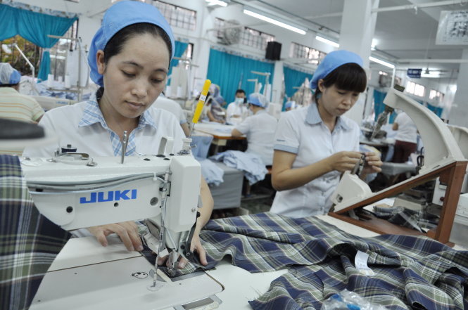 Sản xuất hàng dệt may xuất khẩu sang thị trường Nhật tại Công ty CP may Bình Minh - Ảnh: T.V.N.