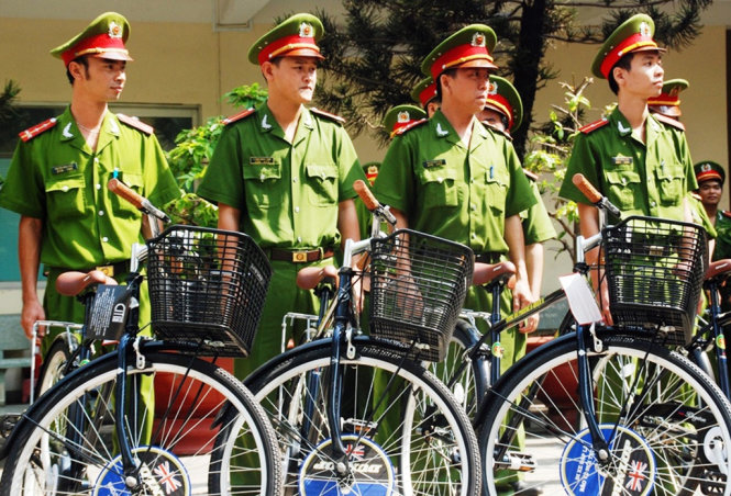 Cảnh sát khu vực trên 15 phường của Q.5 sẽ đi làm bằng xe đạp - Ảnh: A.X