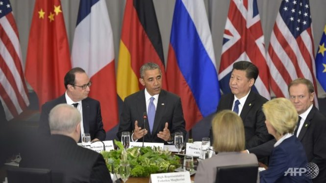 Tổng thống Mỹ Barack Obama (thứ hai bên trái) và chủ tịch Trung Quốc Tập Cận Bình (thứ hai bên phải) nhất trì thực thi triệt để nghị quyết trừng phạt CHDCND Triều Tiên - Ảnh:AFP