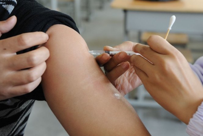 Trung Quốc bắt giữ 202 người liên quan bê bối vắc xin hết hạn sử dụng - Ảnh: AFP