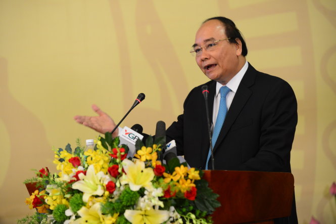Thủ tướng Nguyễn Xuân Phúc phát biểu khai mạc hội nghị doanh nghiệp Việt Nam - động lực phát triển kinh tế của đất nước sáng 29-4 - Ảnh: Quang Định