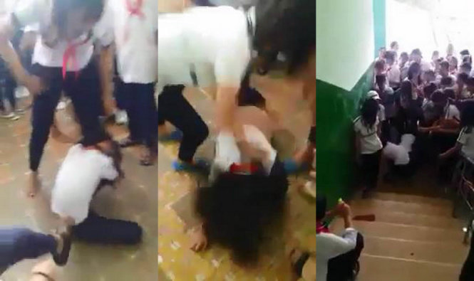 Các nữ sinh đánh hội đồng bạn tại Trường THCS Võ Trường Toản, huyện Vĩnh Cửu - Ảnh cắt từ clip đăng trên Facebook
