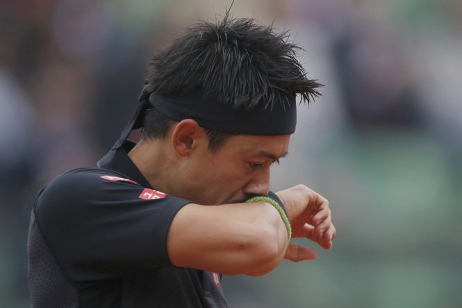 Kei Nishikori bị loại sau trận đấu dưới sức. Ảnh: Reuters