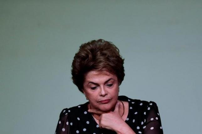 Hi vọng thoát tội đang nhen nhóm với bà Dilma Rousseff sau một loạt bê bối liên quan tới chính phủ tạm quyền ở Brazil bị phanh phui - Ảnh: Reuters