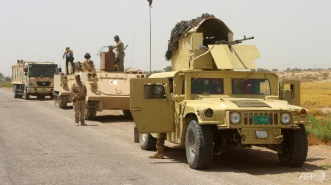 Xe quân sự của quân đội Iraq tham gia chiến dịch phản công ở Fallujah. Ảnh: AFP