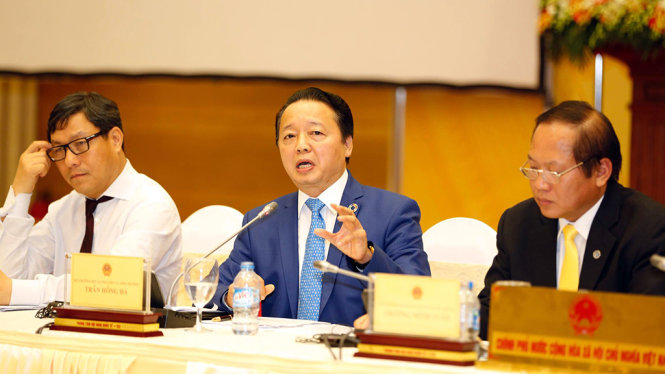 Bộ trưởng Tài nguyên môi trường Trần Hồng Hà trả lời tại họp báo - Ảnh: VIỆT DŨNG