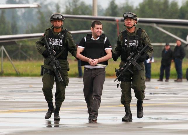 Cảnh sát Colombia dẫn độ trùm El Loco sang Mỹ - Ảnh: Reuters