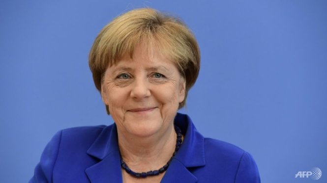 Thủ tướng Đức Angela Merkel tại cuộc họp báo ngày 28-7 Ảnh: AFP