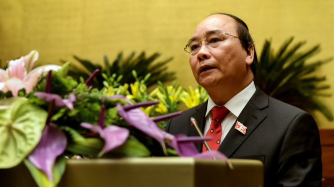 Thủ tướng Nguyễn Xuân Phúc báo cáo trước Quốc hội sáng 29-7 - Ảnh: Việt Dũng