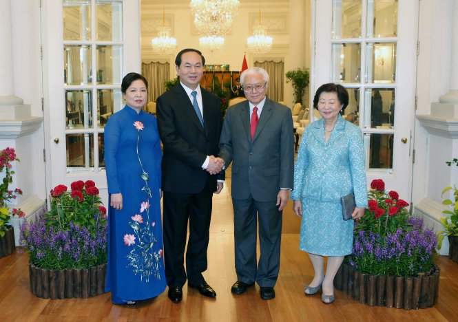 Chủ tịch nước Trần Đại Quang và phu nhân cùng với Tổng thống Singapore Tony Tan Keng Yam và phu nhân - Ảnh: TTXVN