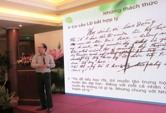 TS Vũ Xuân Hùng trình bày những thách thức đối với lực lượng lao động Việt Nam tại hội thảo - Ảnh: VŨ THỦY