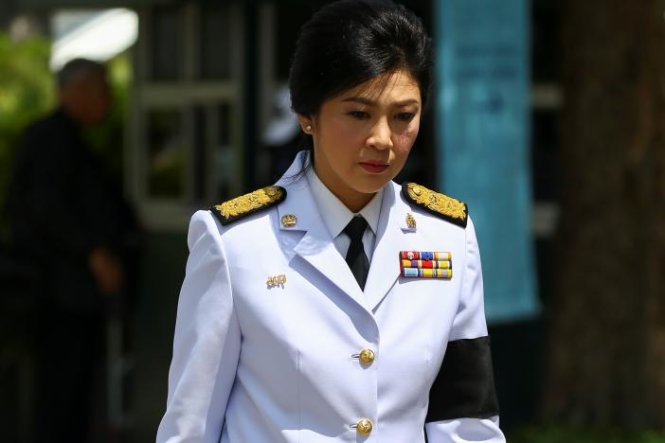 Yingluck Shinawatra arrives at the Grand Palace to offer condolences for Thailand's late King Bhumibol Adulyadej, in Bangkok, Thailand, October 14, 2016. REUTERS/Athit Perawongmetha