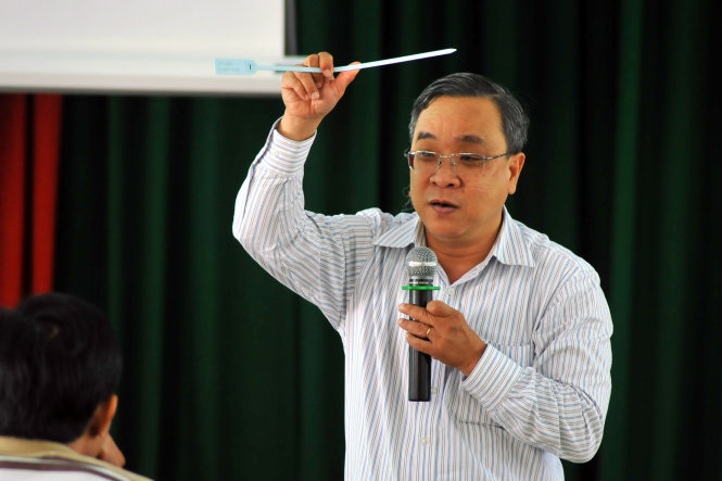 Ông Nguyễn Ngọc Hòa tại buổi tập huấn cho nông dân, hộ kinh doanh Đồng Nai triển khai chương trình truy xuất nguồn gốc thịt heo bằng mã vạch. Ảnh A. Lộc