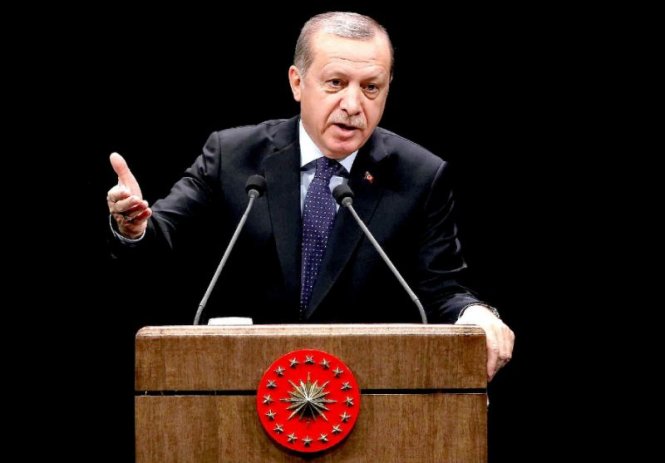 Tổng thống Thổ Nhĩ Kỳ Tayyip Erdogan đe dọa mở cửa biên giới để làn sóng người nhập cư mới tiếp tục tràn vào EU - Ảnh: AFP