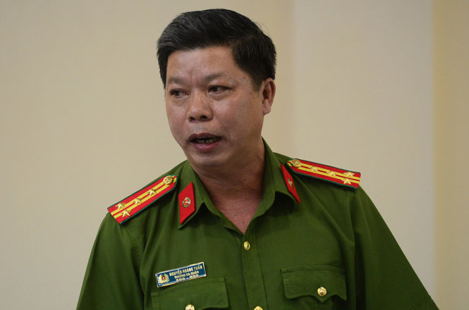 Đại tá Nguyễn Hoàng Tuấn – Trưởng Công an Q. Tân Phú báo cáo tình hình tội phạm trên địa bàn quận - Ảnh: Quang Định
