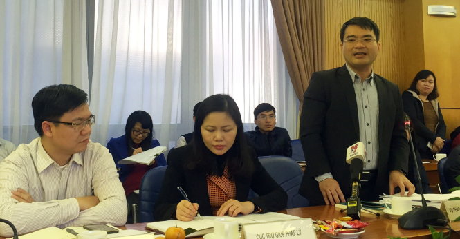 Ông Nguyễn Thanh Tú, Vụ trưởng Vụ Pháp luật Dân sự - Kinh tế trả lời báo chí - Ảnh: Thân Hoàng