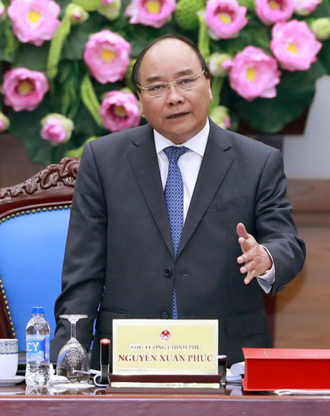 Thủ tướng Nguyễn Xuân Phúc chủ trì cuộc họp trực tuyến về giải pháp chống ùn tắc giao thông tại TP.HCM - Ảnh: TTXVN