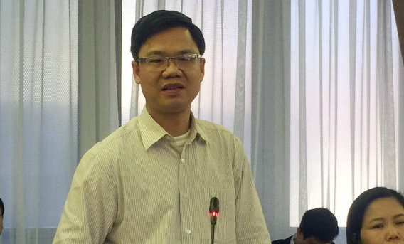 Ông Trần Việt Hưng, Phó cục trưởng Cục Bồi thường nhà nước trả lời câu hỏi của báo chí tại buổi họp báo - Ảnh: Thân Hoàng