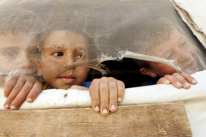Các em bé tị nạn người Syria - Ảnh: Reuters