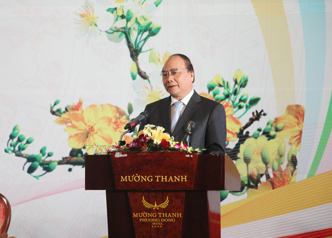 Thủ tướng Chính phủ Nguyễn Xuân Phúc phát biểu tại hội nghị gặp mặt các nhà đầu tư tỉnh Nghệ An sáng 19-2 - Ảnh: DOÃN HÒA