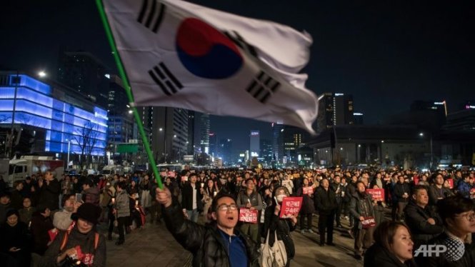 Người biểu tình ở Seoul ngày 4-3 - Ảnh: AFP
