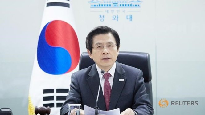 Quyền tổng thống và là thủ tướng Hàn Quốc Hwang Kyo Ahn phát biểu tại Hội đồng An ninh Quốc gia ở Nhà Xanh tại Seoul - Ảnh: Reuters