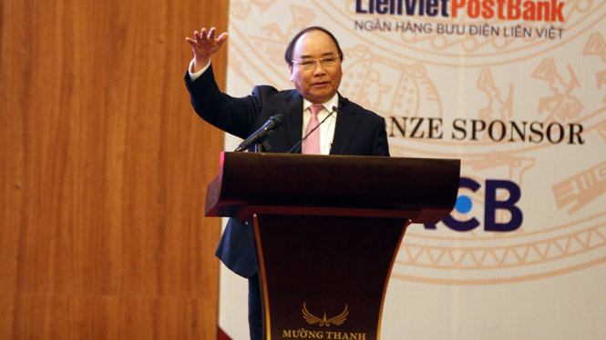 Thủ tướng Nguyễn Xuân Phúc phát biểu chỉ đạo tại hội nghị xúc tiến đầu tư vào Tây nguyên sáng 11-3 - Ảnh: B.D