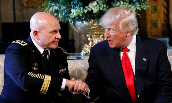 Cap U.S. President Donald Trump shakes hands with his new National Security Adviser Army Lt. Gen. H.R. McMaster after making the announcement at his Mar-a-Lago estate in Palm Beach, Florida U.S. February 20, 2017