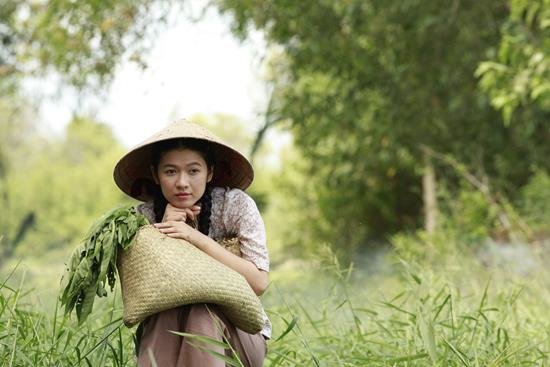 Oanh Kiều vai cô Út Trong ngày trẻ với tạo hình mộc mạc trong trẻo - Ảnh: ĐPCC