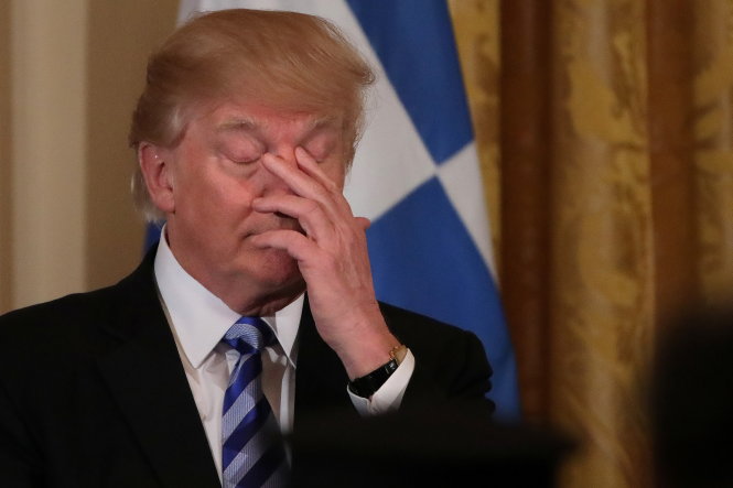 Tổng thống Donald Trump tại Nhà Trắng ngày 24-3 - Ảnh: Reuters