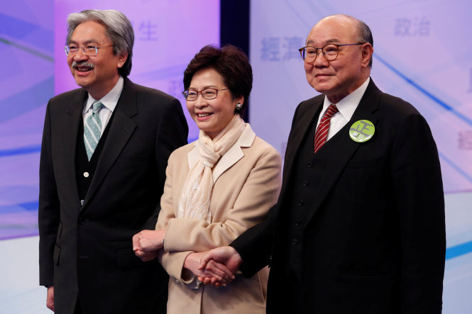 Ba ứng viên Đặc khu trưởng Hong Kong (từ trái sang) Tăng Tuấn Hoa, Lâm Trịnh Nguyệt Nga và Hồ Quốc Hưng - Ảnh: Reuters