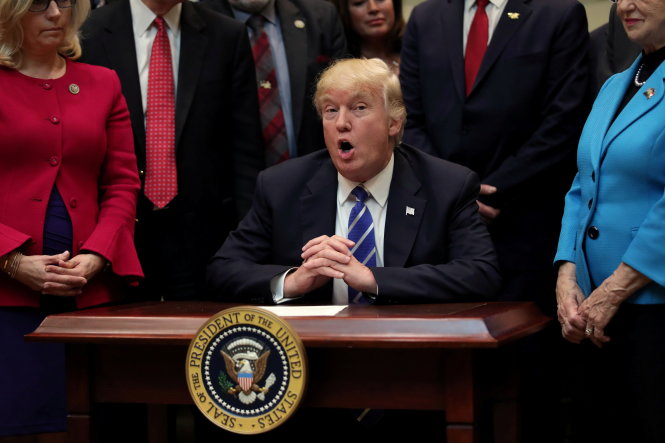 Tổng thống Donald Trump tại Nhà Trắng ngày 27-3 - Ảnh: Reuters